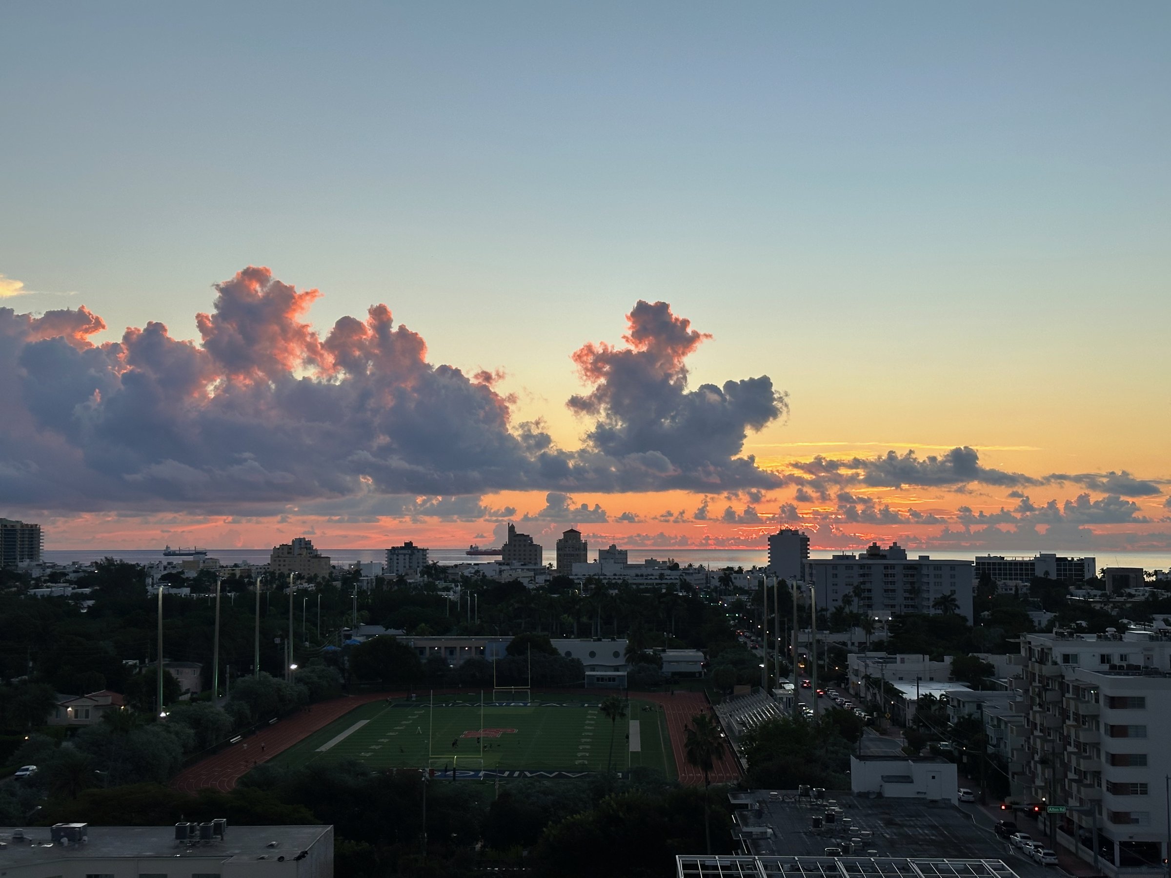 Pink sunset clouds from balcony overlooking South Beach