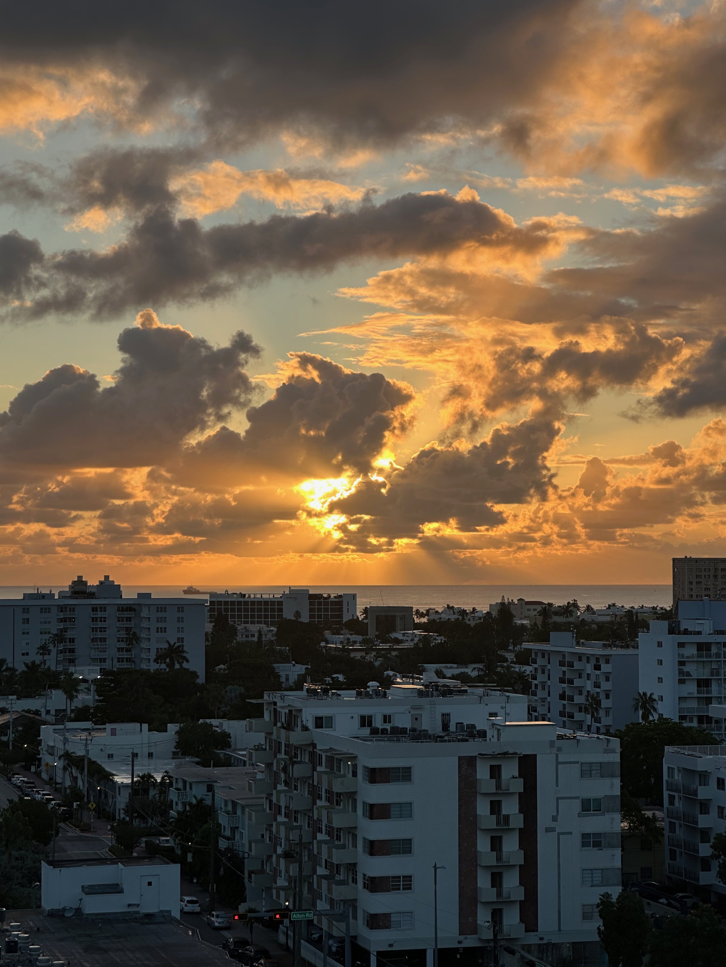 Golden dramatic sunset over South Beach rooftops