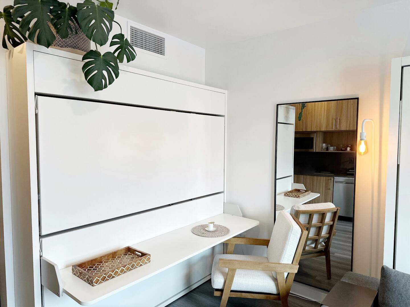 Murphy bed folded up revealing desk workspace